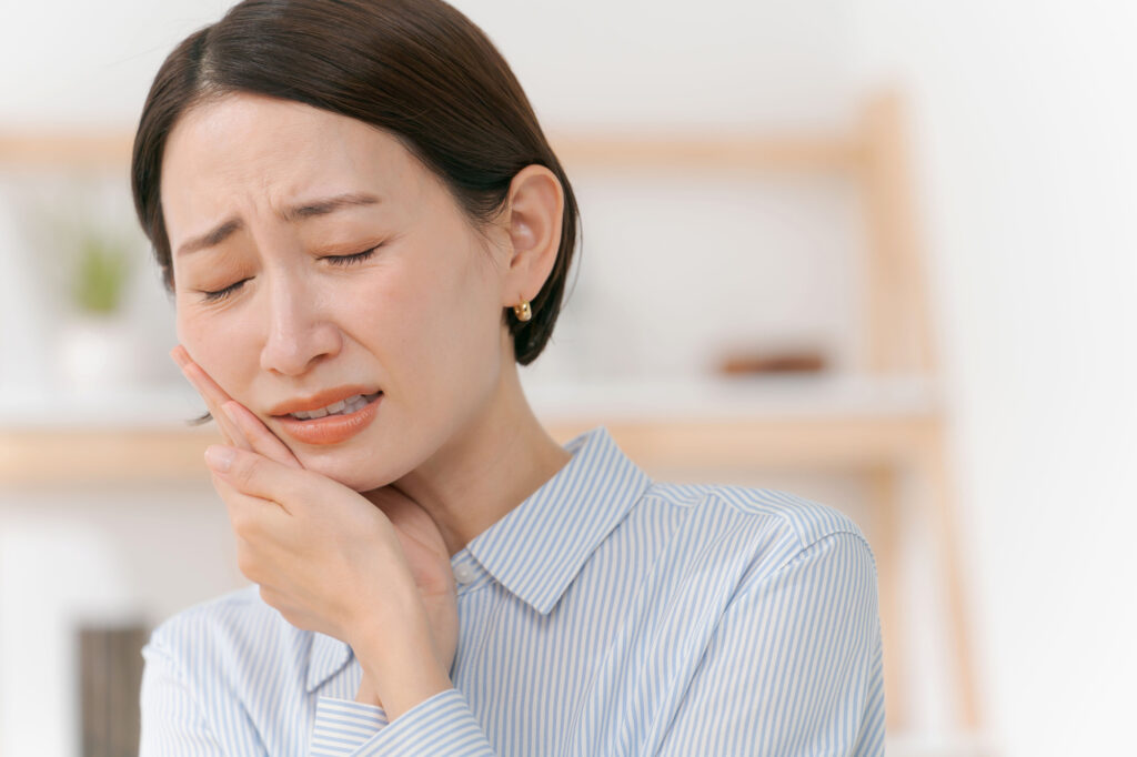 歯医者の行くのが不安な女性